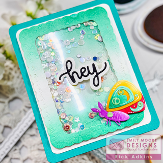 Bring a fresh burst of color to your spring cardmaking with this bright and cheerful shaker card featuring layered die cuts and soft ink blending