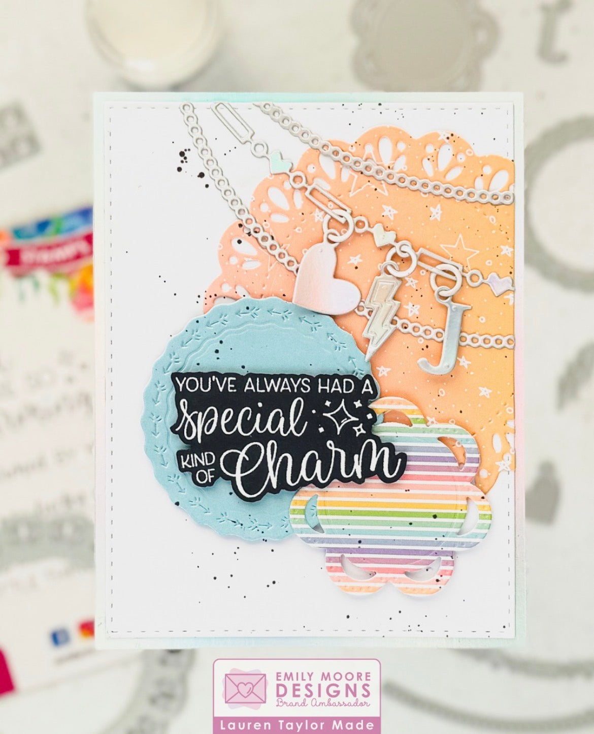 A special kind of charm card with an initial