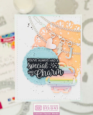 A special kind of charm card with an initial